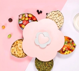 Serveringsskål formet som en blomst til nødder og slik – lyserød