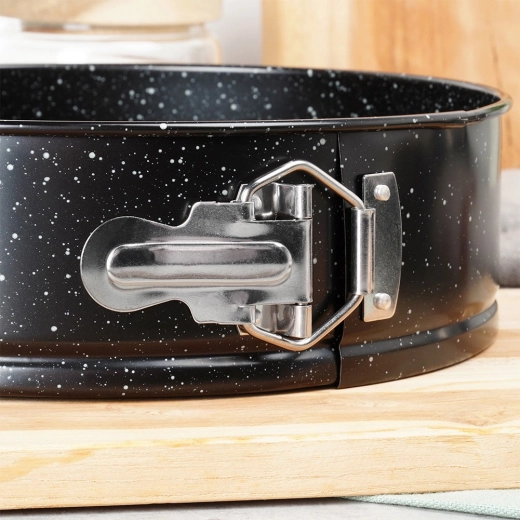 Udløselig kant med sikkerhedslås