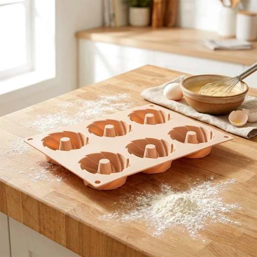 6 fordybninger med skorsten for jævn bagning