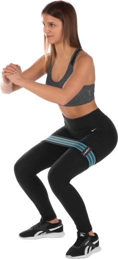 Ideelt over knæene og på lårene