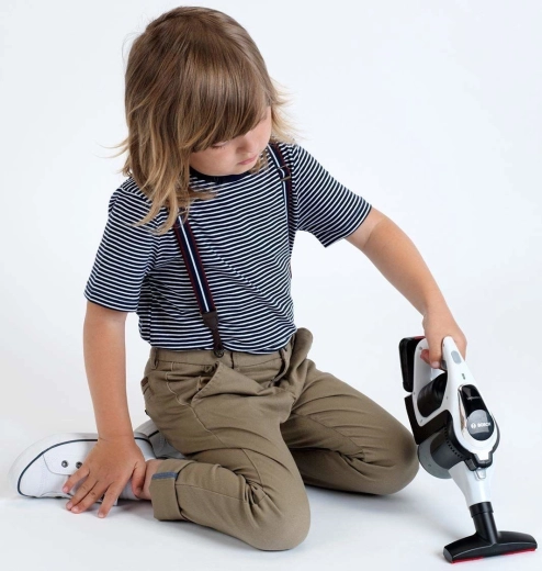 Åbnbar beholder og roterende kugler