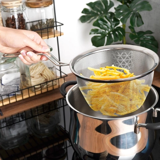 Sikker håndtering over gryden