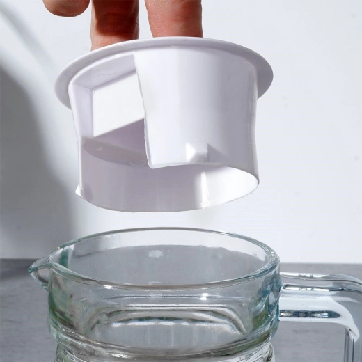 Praktisk låg for renere servering