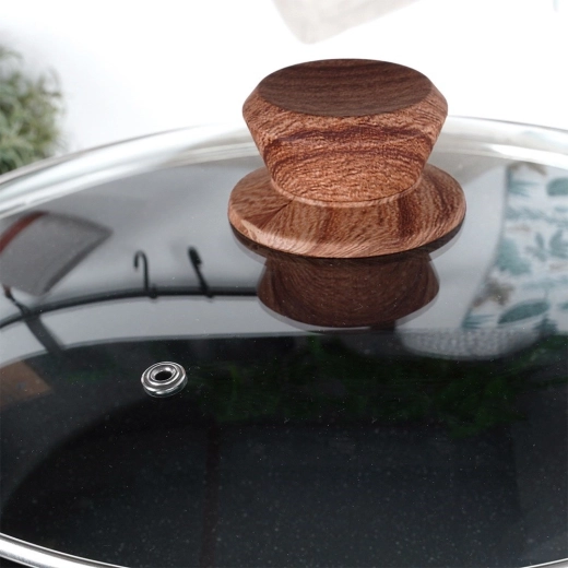 Glaslåg og køligt håndtag i trædekor