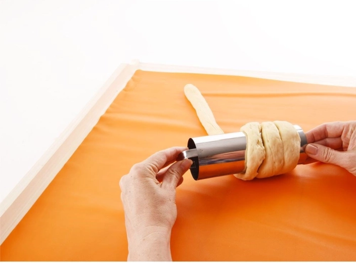 Glat overflade i rustfrit stål for jævn bagning