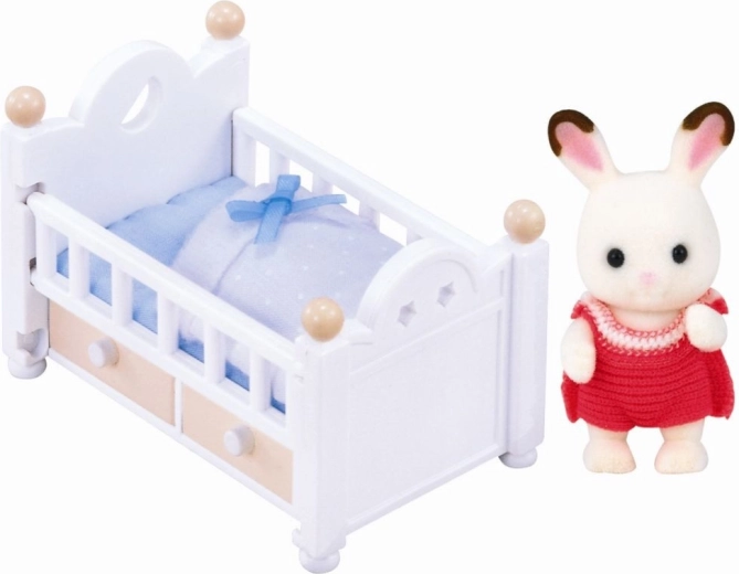 Chocolate-kaninunge i babyseng – babyfigur med tilbehør