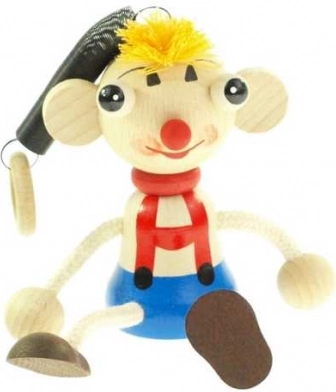 Dreng med store øjne på fjeder træfigur