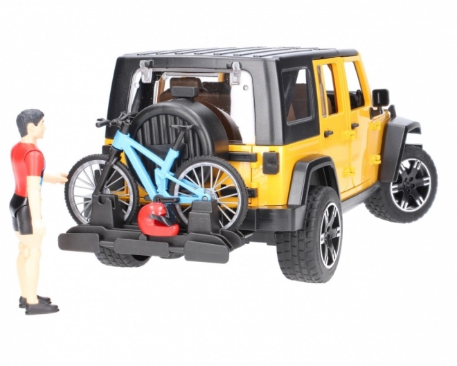 Bruder Jeep Wrangler Rubicon med cyklist og cykel
