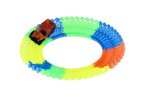 Skinne der lyser i mørke + batteridrevet bil i plast 57 dele længde 72 cm på kort 17x24x7 cm
