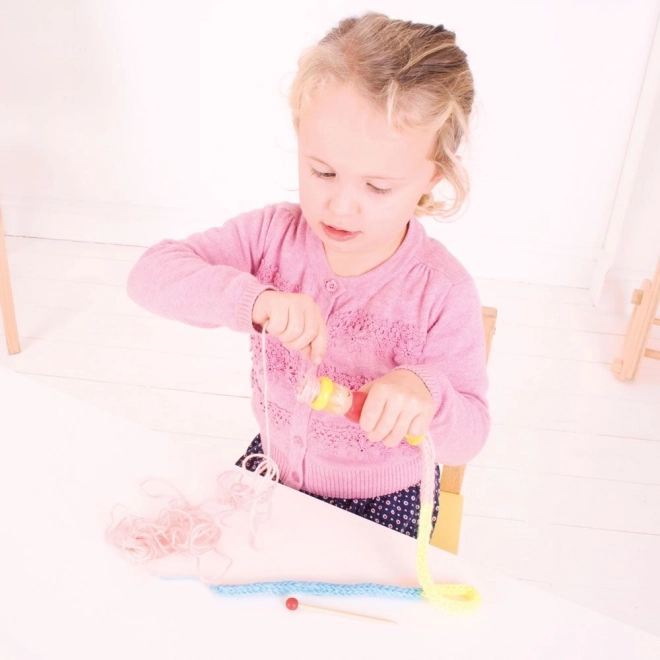 Bigjigs Toys strikkedukke