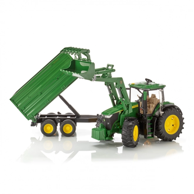 Traktor John Deere 7R med frontlæsser og trailer