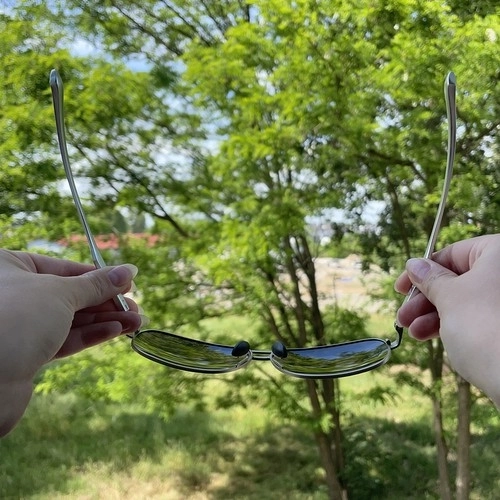 Trizand solbriller med etui og pudseklud