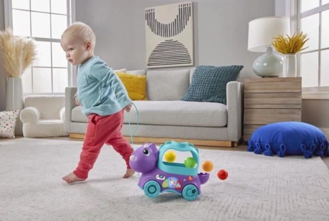 Interaktivt legetøj Dino med hoppende bolde