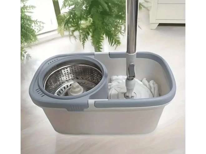 Roterende moppe med spand og mikrofiberpude