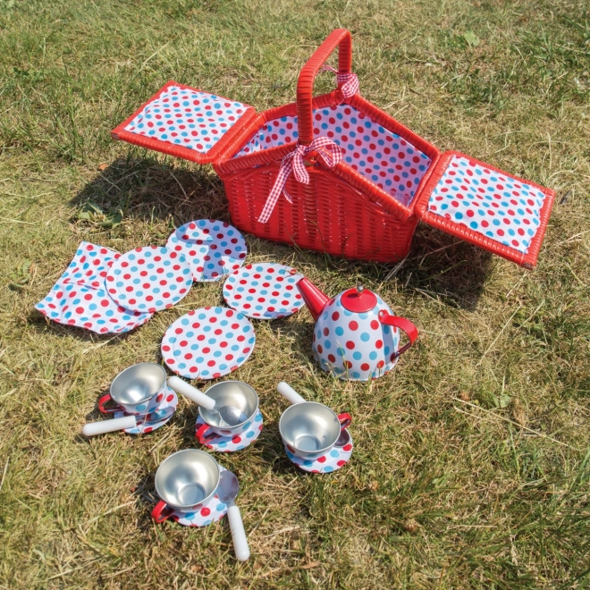 Teparti sæt med prikket mønster i picnickurv