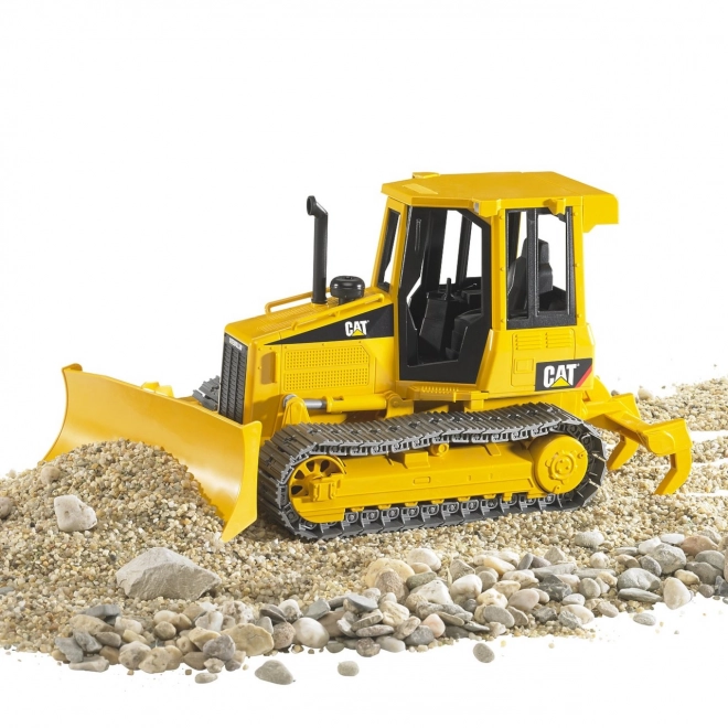 Lille bulldozer CAT fra Bruder