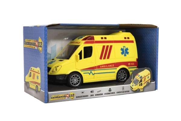Auto ambulance plast 20cm med inertimotor på batterier med lyd og lys i en boks 26x15x12cm