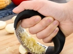 Ergonomisk hvidløgspresser i rustfrit stål